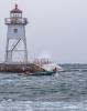 Tyler Smith and Eric Brisson heading out to check nets. Photo by David R. Johnson Photography